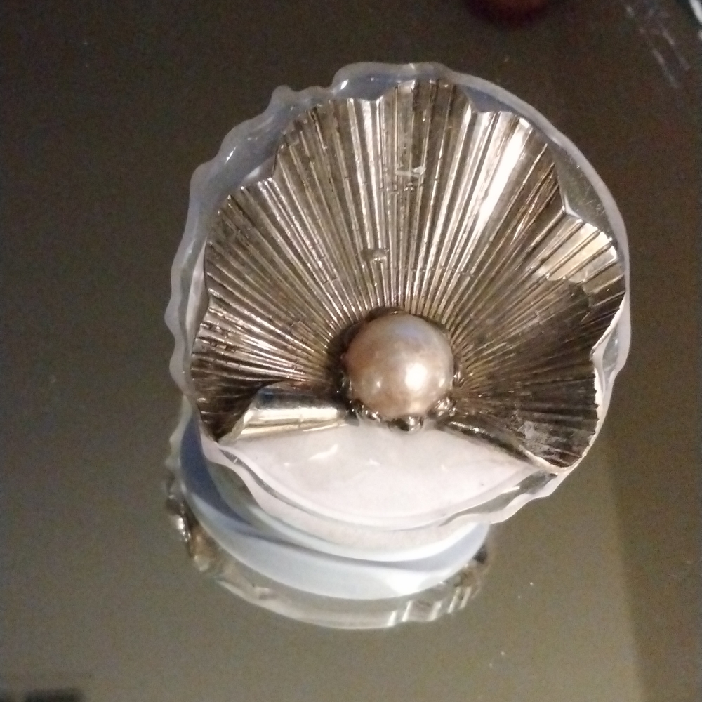Handmade one of a kind phone stand/grip. Sterling seashell with Pearl.